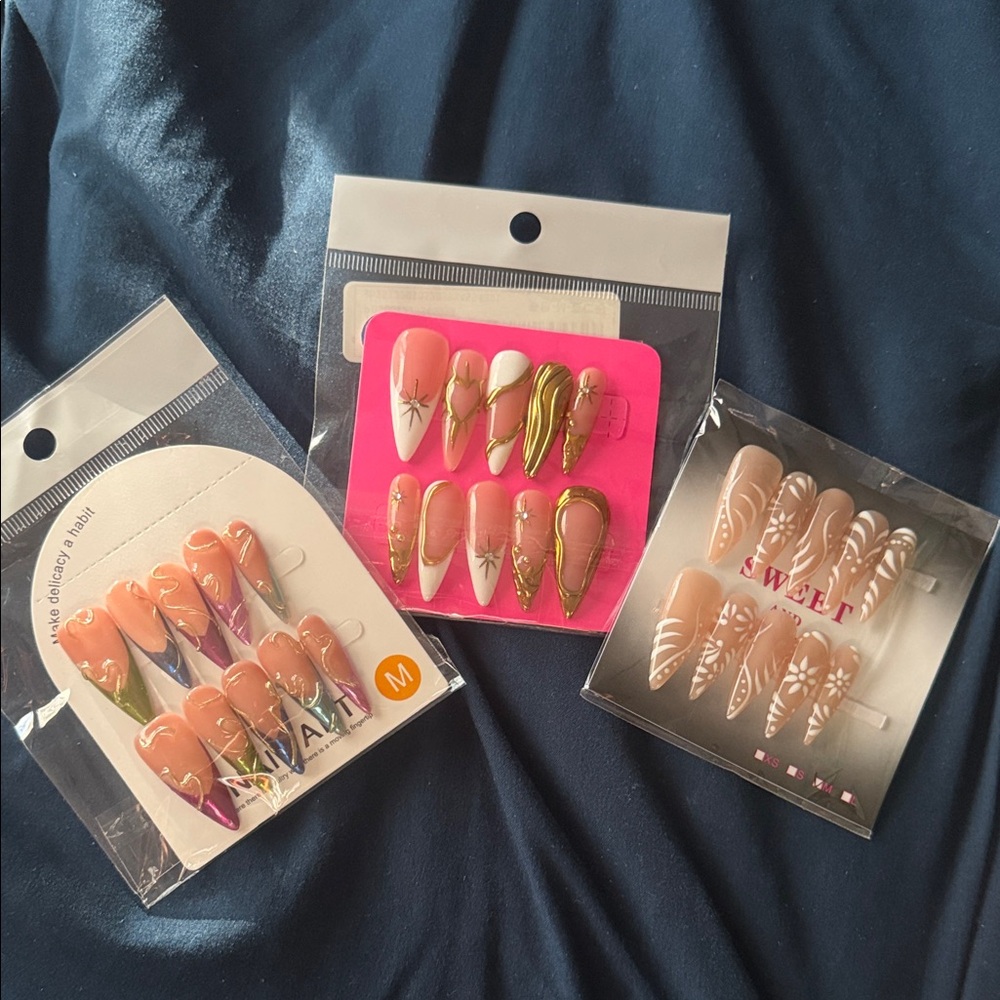 Stylish Nail Art Set with Pink and Gold Designs